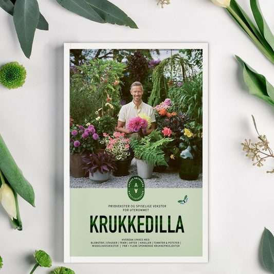 "Krukkedilla" – den ultimate guiden for alle som elsker prydplanter og spiselige vekster. Denne boken er full av informasjon, praktiske tips, kreative ideer og ekspertråd for å hjelpe deg med å skape din egen grønne oase!