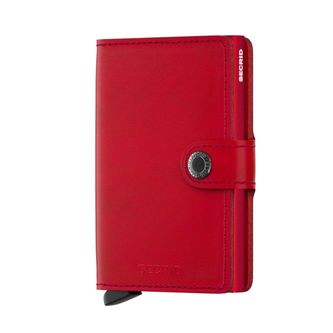 Miniwallet fra Secrid kombinerer eleganse og funksjonalitet. Den beskytter kortene dine mot bøying, brudd og RFID-tyveri. Skallet rommer sedler, kvitteringer og kort. Laget med fokus på bærekraft. En perfekt lommebok for hverdags bruk i original rød!
