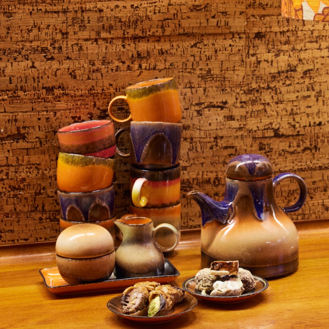 Liberica kaffekopp i retro stil oransje og gylne detaljer fra HK Living.